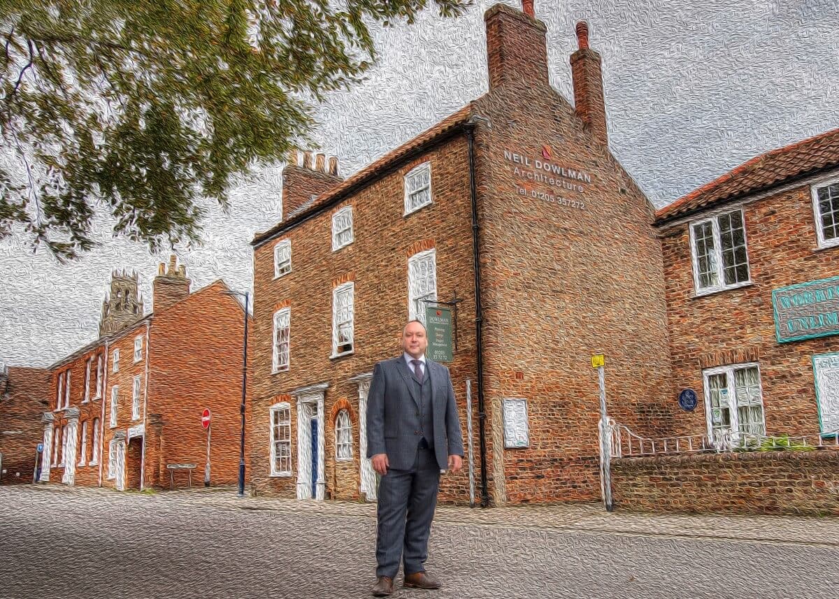 Neil Dowlman stood outside offices